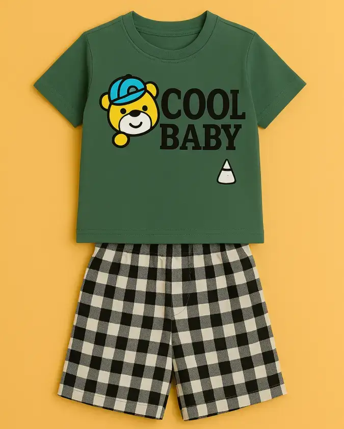 Boy wearing Cool Baby summer outfit with green T-shirt and checks