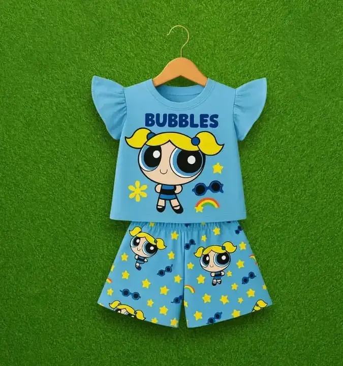 Girl wearing Bubbles blue cartoon summer outfit with star prints
